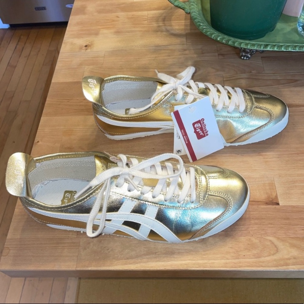 These are brand new unworn retro gold and white onitsuka tiger asic sneakers.